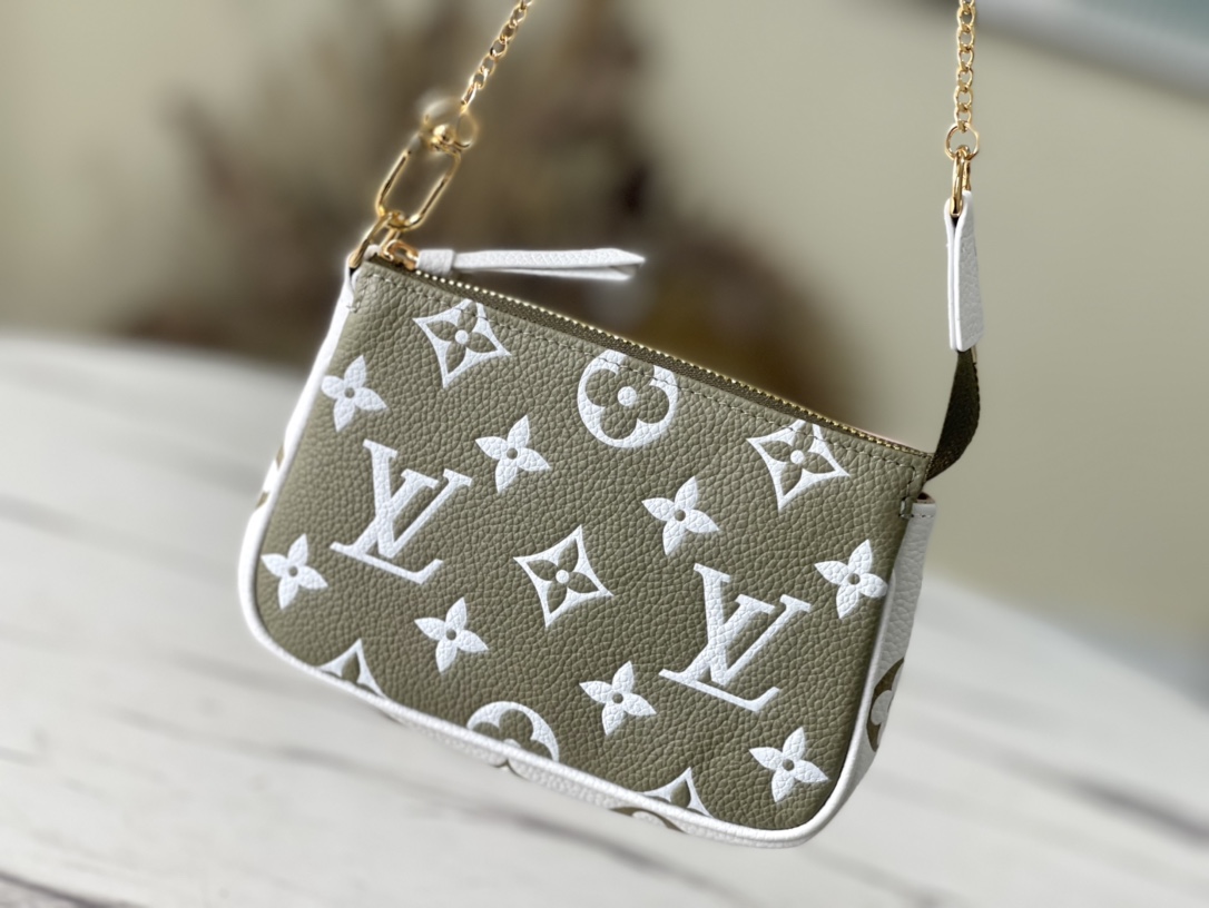 Louis Vuitton Mini Pochette Accessoires Monogram Empreinte Leather – WOMEN – Small Leather Goods M81284